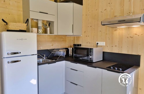 Saint-Berthevin Cottage | Peaceful Chalet at Camping de Coupeau for 4 Guests