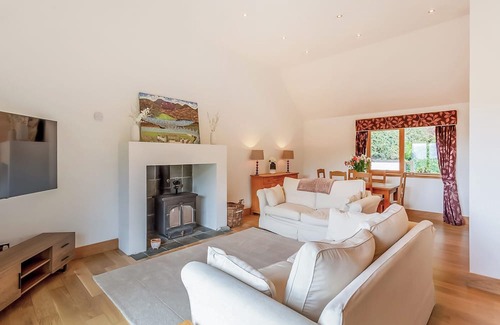 The Braes Cottage | Corrie Burn Villa is located on Braes of Ullapool with spectacular sea views.