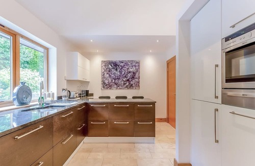 The Braes Cottage | Corrie Burn Villa is located on Braes of Ullapool with spectacular sea views.