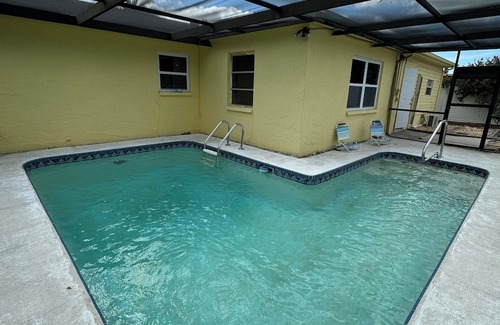 Palm Terrace Gardens House | nCozy Gulf Coast Getaway 3 BR 2 BA house in charming Port Richey with WiFi, AC.