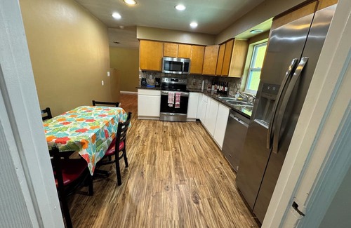Palm Terrace Gardens House | nCozy Gulf Coast Getaway 3 BR 2 BA house in charming Port Richey with WiFi, AC.