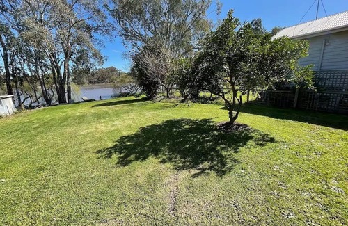 Kirwans Bridge House | Waterfront 4 Bedroom Home with Rumpus Room