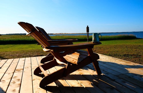 Hamilton Cabin | Private, relaxing seaside retreat. Fun outdoor amenities for everyone.