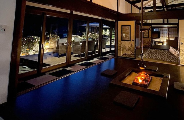 A house with a hearth surrounded by Mt Fuji and Y / Hokuto Yamanashi