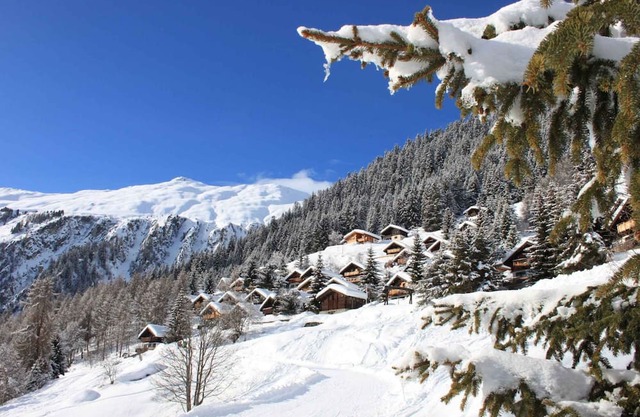 Chalet with balcony and heating
