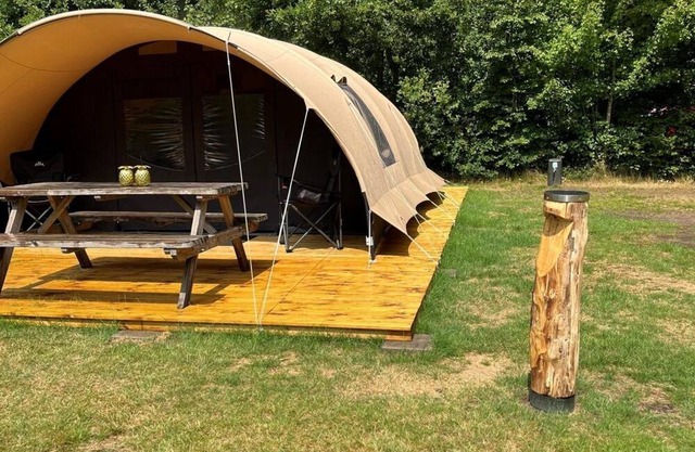 Enjoy the space and comfort of our De Waard Tunnel Tent with two sleeping areas and a spacious canopy.
