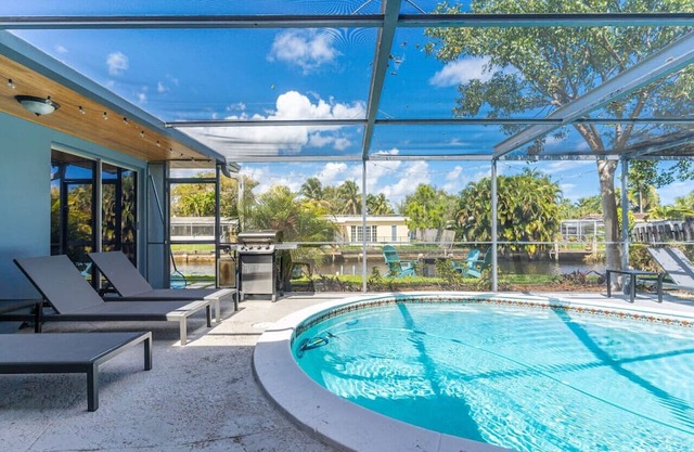 Charming Poolside Haven on Water's Edge