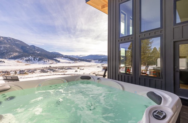 Big sky luxury cabin w/ private hot tub & views