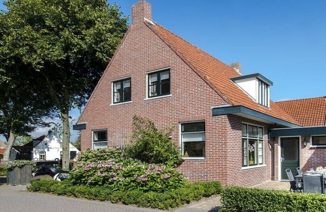 Holiday home in Nes with swimming pool