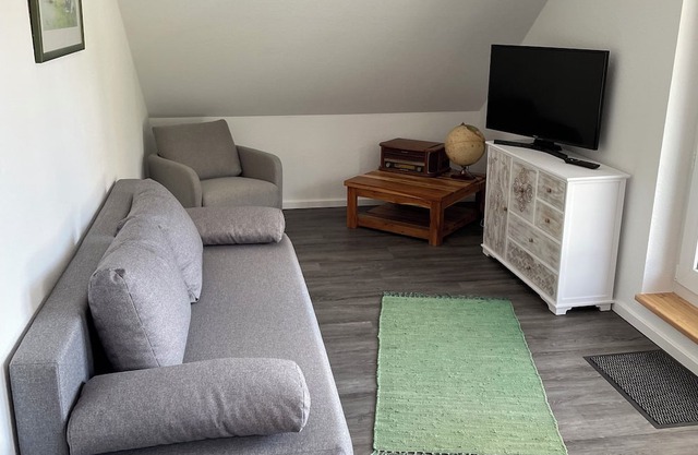 Vacation apartment with large roof terrace overlooking the greenery on the edge of the forest