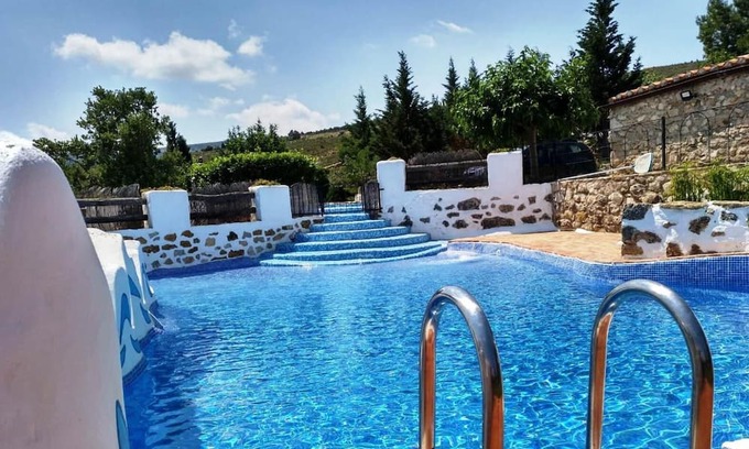 La Torre d'En Besora House | Holiday Home 'Moli Colomer' with Mountain View, Shared Pool and Private Terrace
