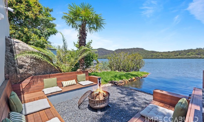 Central Coast Council House | Discover Your Riverside Retreat: Modern Comforts, Private Jetty, & Scenic Views!
