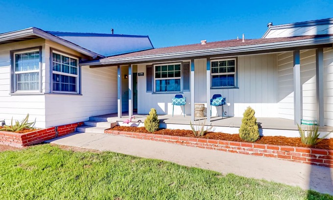 Coastal San Pedro House | Dog-friendly home with a firepit, fireplace, foosball, enclosed backyard, grill