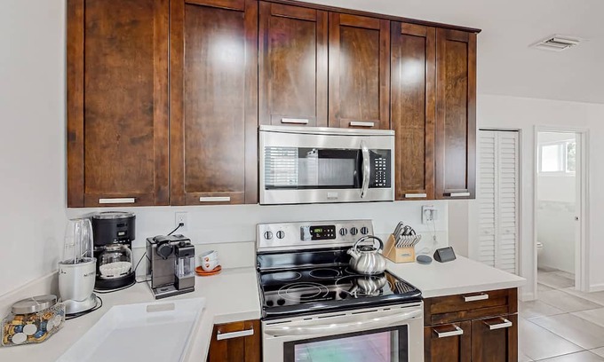 South Corals House | Renovated home with super-fast WiFi, patio, BBQ, AC, & private W/D