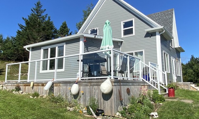 Halifax County House | Renovated 150 year old house, snuggled in the cove with ocean views