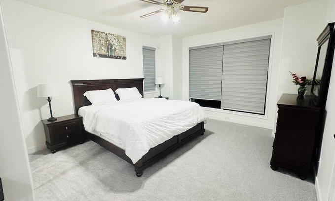 Chestermere House | Delightful ground level basement with AC in charming Chestermere